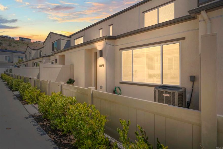 WHAT AN AMAZING VALUE FOR THIS NEW, CRISP AND CLEAN TOWNHOME, OFFERING MINIMALIST, NO MAINTENANCE STYLE LIVING IN THE BEAUTIFUL CITRO COMMUNITY, SURROUNDED BY NATURE, LARGE OPEN SPACES, BLUE SKY AND YEAR ROUND BREEZES.  THIS MEYER PLAN ONE IS A MODERN ATTACHED HOME WITH TWO BEDROOMS, TWO CAR GARAGE, STRIKING KITCHEN CABINETRY WITH CONTRASTING QUARTZ COUNTERTOPS, UPGRADED APPLIANCES AND COOL LVP FLOORING COMBINED WITH OWNED SOLAR SYSTEM, EPOXY GARAGE FLOORING AND INCLUDES REFRIGERATOR, WASHER AND DRYER. COMPLETE SET FOR A PERFECT START OF OWNING YOUR HOME! CITRO COMMUNITY, FAMOUS FOR ONE OF THE BEST NEW COMMUNITIES IN SAN DIEGO COUNTY IS A PERFECT BLEND OF MODERN AGRICULTURE AND COMFORT LIVABILITY.