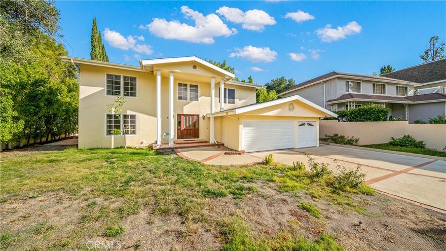 Move-in ready Colonial-style home in highly desirable West Hills, located within the award-winning Las Virgenes School District! This beautifully maintained 3-bedroom, 3-bath residence offers exceptional versatility, comfort, and charm. Inside, you'll find an additional bonus room ideal for a home office, gym, or creative studio—whatever suits your lifestyle. The spacious downstairs family room, complete with its own fireplace and full bathroom, can easily serve as a fourth bedroom or a private guest suite. The bright and airy kitchen is truly a chef’s delight. Showcasing thoughtful upgrades and pride of ownership, it features an inviting eat-in dining area, updated appliances, built-in microwave, trash compactor, organized pantry, custom pull-out cabinetry, dual ceiling fans, and a charming built-in curio cabinet. Upstairs, the primary suite is highlighted by a custom-designed walk-in closet, providing exceptional storage and organization. Step outside to your own private oasis! The backyard is perfect for entertaining with a sparkling pool, cozy firepit, and a fully equipped outdoor kitchen complete with grills and sink—ideal for weekend gatherings and summer evenings. Additional features include a 3-car garage, central heat and air, and energy-efficient European windows and patio doors, providing comfort and savings year-round. This West Hills gem blends functionality, style, and an incredible location—truly a home you can be proud to own.