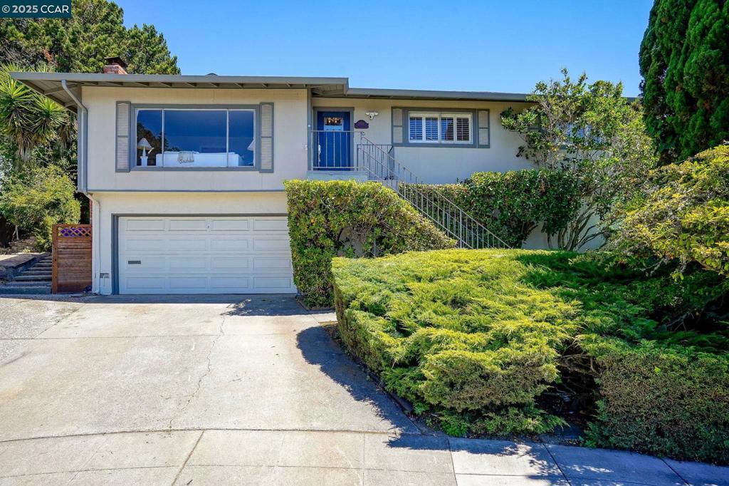 Get ready to fall in love with this light-filled 3-bedroom, 2-bath charmer where stunning water views greet you the moment you walk through the door. Freshly painted throughout with brand-new carpet and stylish lighting, this home is move-in ready and full of personality. Step into the sun-drenched living room and soak in the views from the oversized front window. The open-concept layout flows effortlessly into the updated kitchen and cozy family room—complete with pellet stove and built-in bar—ideal for hosting everything from game nights to holiday get-togethers.The spacious primary suite features a brand-new vanity in the private en suite bath, while two additional bedrooms offer flexibility for guests, a home office, or whatever your lifestyle demands. The hall bath and convenient laundry closet add to the home's smart functionality. Outside, you'll find two back decks perfect for dining al fresco or relaxing under the stars. Head to the top of the property and discover panoramic water views that beg for a custom deck or dream hangout spot—sunsets, stargazing, or your own private retreat. All this and a back up generator so no worry about power ever!