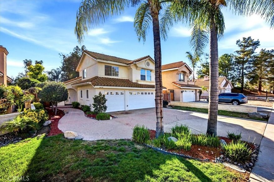 Nestled in the desirable California Oaks neighborhood of Murrieta, this vaulted ceiling home with 4 bedroom, 2.5 bathroom home will provide the perfect space for you and your family. The formal living room and dining room with wrap around fireplace provide the perfect space for entertaining. The heart of the home , the kitchen, seamlessly opens to the family room, making it ideal for cooking and socializing. Step outside to discover a spacious backyard designed for relaxation with palm trees and lush greenery as property backs to Barratt Parks walking trail allowing for beautiful serene nights. Additional conveniences include a large Master bedroom with en-suite bathroom, his and her closets and deck overlooking the backyard. Nicely appointed additional 3 bedrooms. Low tax rate and no Homeowner's association dues. Close to freeways, shopping, and restaurants.