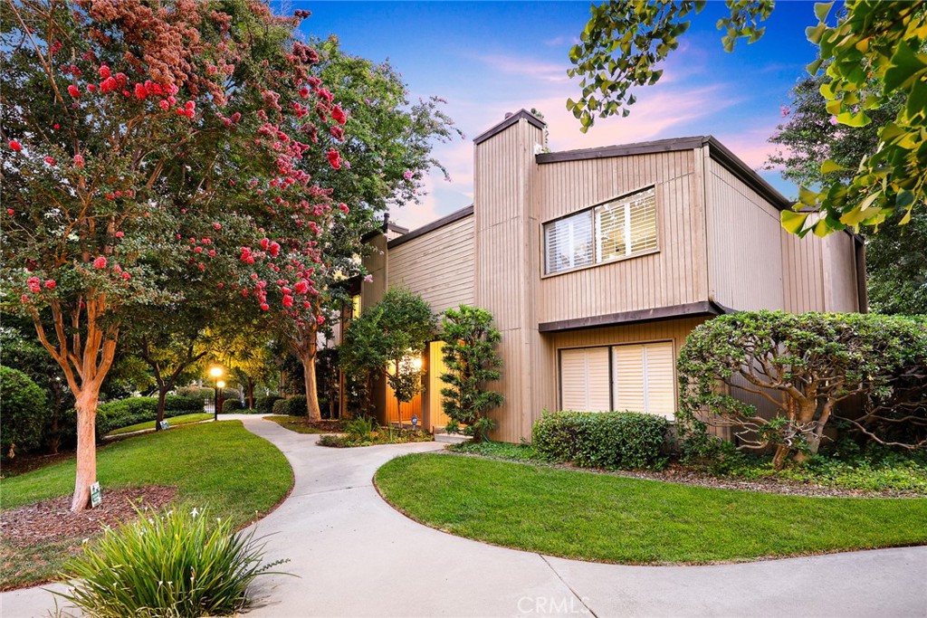 WELCOME TO THE HIGHLY DESIRABLE “ORANGE GROVE VILLAGE,” A CHARMING COMMUNITY NESTLED IN THE LUSH, PICTURESQUE LANDSCAPE OF OLD TOWN PASADENA. THIS PRIME LOCATION IS JUST MINUTES FROM THE ICONIC ROSE BOWL, GAMBLE HOUSE, CASTLE GREEN, MUSEUMS, THE ARROYO, AND ALL THE DINING, SHOPPING, AND ENTERTAINMENT OLD TOWN PASADENA HAS TO OFFER. THIS BEAUTIFULLY REMODELED HOME FEATURES TWO SPACIOUS MASTER SUITES AND 2.5 BATHROOMS ACROSS 1,450 SQUARE FEET OF LUMINOUS LIVING SPACE. THE RESIDENCE INCLUDES A DETACHED 2-CAR GARAGE AND IS LOCATED IN A RESORT-STYLE COMPLEX OFFERING AMENITIES SUCH AS TENNIS COURTS, SWIMMING POOLS, SPAS, AND POPULAR CLUBHOUSES. INSIDE, YOU'LL FIND A COMPLETELY REMODELED INTERIOR WITH TASTEFUL DESIGNER FINISHES AND A MODERN OPEN-CONCEPT LAYOUT. THE CHEF’S KITCHEN IS A STANDOUT, FEATURING QUARTZ COUNTERTOPS, STAINLESS STEEL APPLIANCES, AND CUSTOM CABINETRY. TIGER RED WOOD, HARDWOOD FLOORS FLOW SEAMLESSLY THROUGHOUT THE HOME, INCLUDING THE CUSTOM WOOD STAIRCASE AND UPPER HALLWAYS. DESIGNED FOR COMFORT AND FLEXIBILITY, THE HOME INCLUDES TWO DISTINCT LIVING AREAS, A COZY DINING ALCOVE, AND A TRANQUIL OUTDOOR PATIO PERFECT FOR AL FRESCO DINING OR RELAXING. THE PRIVATE BACK PATIO FEATURES TILE FLOORING AND SERVES AS AN IDEAL RETREAT. A CUSTOM FIREPLACE WITH A TRADITIONAL MANTEL, RECESSED LIGHTING, AND AMPLE NATURAL LIGHT ADDS WARMTH AND CHARACTER TO THIS ELEGANT HOME. IF YOU’RE SEARCHING FOR THE PERFECT BLEND OF LOCATION, LUXURY, AND LIFESTYLE, THIS EXCEPTIONAL PROPERTY CHECKS EVERY BOX. COME SEE FOR YOURSELF WHAT MAKES ORANGE GROVE VILLAGE ONE OF PASADENA’S MOST SOUGHT-AFTER COMMUNITIES.
