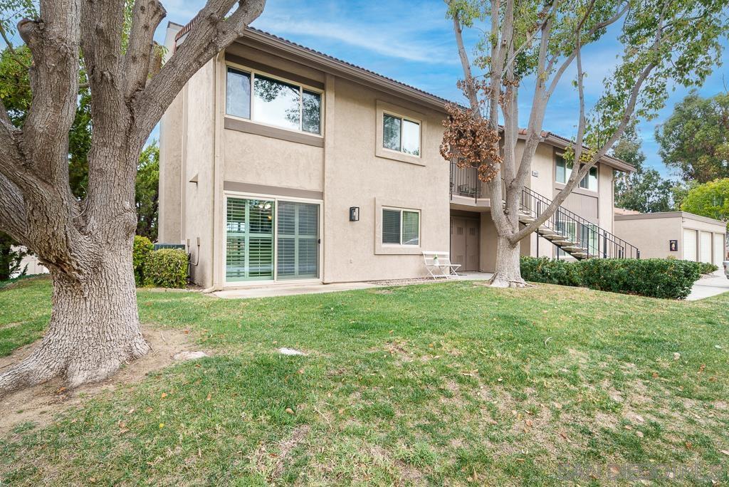 Luxury 55+ elegant & prime location single level (no steps) downstairs corner unit townhome/condo with a versatile floor plan. 2 full bedrooms and an additional optional 3rd bedroom/office/den! Interior Features include keyless entry and a security screen for added peace of mind. Crown molding, wood shutters, and laminate flooring add elegance throughout. New paint throughout, new LED lights, and new handles have been added to all interior doors provide a fresh, modern touch. The HVAC system has been updated and the ducts have been cleaned. The great room features a gas fireplace with front and back private patio access with partial views overlooking Oaks North. The bathrooms have been fully updated including granite counters, and soft-close drawers. The kitchen has been updated with granite counters, white cabinets that provide function and beauty. Includes an oversized 1-car garage with shelving, a workbench and keyless entry. This stunning rental combines luxury, security, and function.