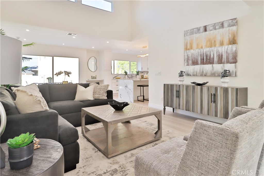 Stunning One-story home in Woodland Hills! 3 bedrooms, 3.5 bathrooms 1,635 sq. ft. of living space on a 7,200 sq. ft. lot. The open floor plan boasts high ceilings, brand-new gourmet kitchen with quartz countertops, an oversized island, and stainless-steel appliances, including a smart refrigerator. Sleek vinyl flooring runs throughout the home. Each bedroom features its own private en-suite bathroom, while the primary suite includes a walk-in closet and direct access to the backyard. The spacious, low-maintenance yard is perfect for entertaining, complete with a new deck and gated driveway with ample parking. Conveniently located within walking distance to premier shopping, dining, and entertainment at The Village at Warner Center, Costco, AMC Theaters, and Warner Center Park. Easy access to the Metro Orange Line makes commuting a breeze. Sorry no pets!