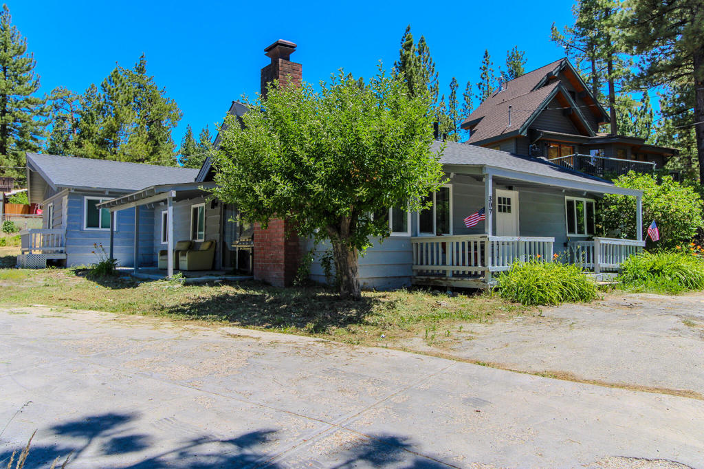 PRICE REDUCED 30K... Fully remodeled 4-bedroom cabin with lake views, walking distance to Big Bear Lake and close to the Village, shops, restaurants, and ski resort. Updates include a new roof, new drywall and insulation, fresh paint inside and out, modernized rooms, kitchen, and bathrooms, double-pane doors and windows, complete electrical rewiring, new water heater, plumbing, flooring, lighting, all Samsung appliances, patio, furnace, and separate laundry with washer/dryer. Ideal for weekend escapes or vacation rentals. Move-in ready and close to year-round activities.