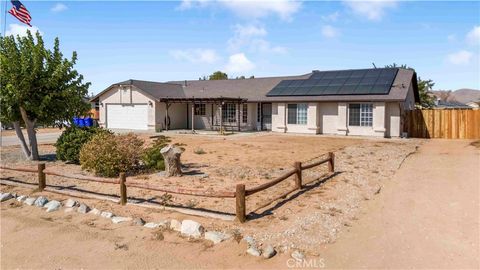 Photo of 15189 Tonikan, Apple Valley, CA 92307 (MLS # CV25277970)