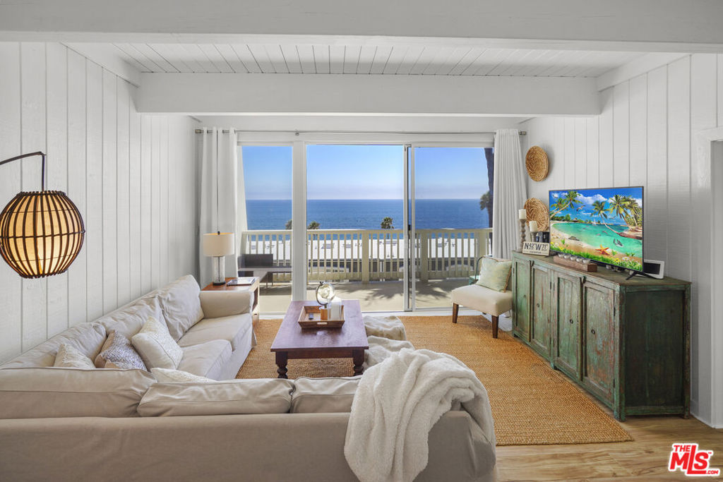 Experience the epitome of Malibu coastal living in this stunning Malibu Bay Club condo. Boasting panoramic ocean and island views with private beach access, this 2 bed, 2 bath retreat offers a blend of luxury and comfort. Recently upgraded with a granite kitchen, stone tile baths, and a spacious balcony ideal for whale watching or checking the surf. Guard-gated for security, with community pool & spa, against a backdrop of breathtaking sunsets and world class surfing.