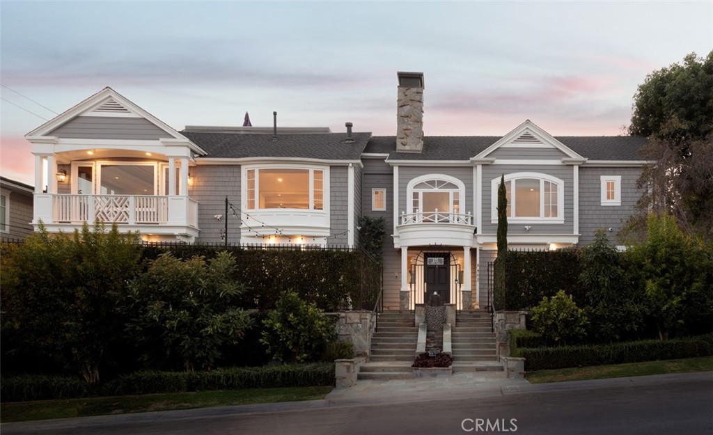 Step into refined elegance and timeless charm with this impeccably designed Cape Cod-inspired estate in the sought-after, private cul-de-sac of Cliff Haven. Spanning 6800 sqft, this luxurious residence offers five bedrooms and 7 bathrooms of classic sophistication and modern comfort. Meticulously designed with premium finishes such as marble counters, custom built-ins, crown moldings, and designer lighting, this home exudes a level of quality rarely seen. The expansive chef's kitchen with coffered ceilings is perfect for hosting gatherings, while the multiple indoor/outdoor spaces and rooftop deck offer breathtaking views and endless entertainment possibilities. With a master suite, guest quarters, elevator, wine cellar, and infinity pool, this home is a true oasis of tranquility and luxury. Enjoy the convenience of being just a short stroll away from top-rated schools, trendy boutiques, and world-class dining establishments. Experience the epitome of sophisticated luxury living in this exceptional estate, where every moment is infused with elegance and comfort.