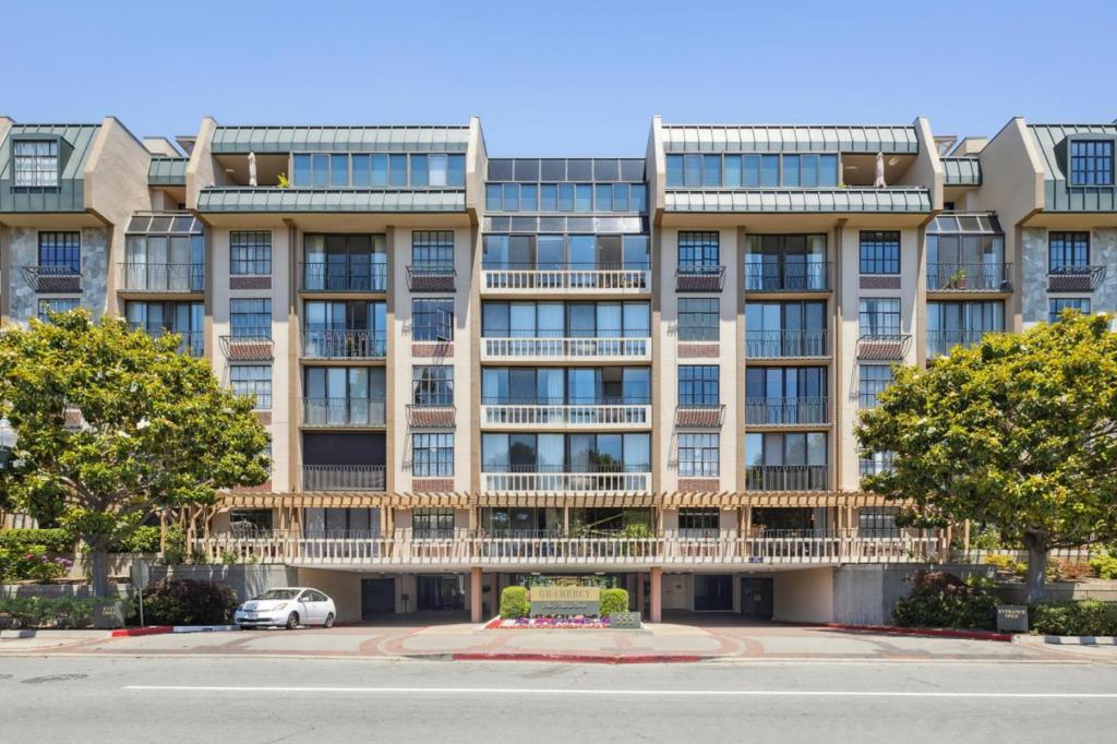 Experience refined living in one of the most coveted locations in downtown: Gramercy on the Park, directly overlooking beautiful Central Park. This spacious, thoughtfully designed residence offers a seamless floor plan and breathtaking park views that create a true sense of serenity and connection to nature. Extensively remodeled in 2017, the home features elegant hardwood flooring, designer finishes, and a masterfully updated eat-in kitchen. The open dining area is perfect for both daily living and effortless entertaining. The sophisticated living room boasts a stunning stone fireplace and a wall of floor-to-ceiling glass doors that open to a vibrant patioyour own private retreat. The expansive primary suite includes an oversized window with park views, a walk-in closet, and a beautifully appointed en-suite bath. This secure building is complete with on-site management and a door person, plus top-tier amenities including a lush indoor-outdoor courtyard, heated pool, hot tub, sauna, and fitness center. Additional conveniences include in-unit laundry room, dedicated storage, and garage parking. Enjoy unbeatable access to downtown shopping, dining, and top medical facilitiesa rare opportunity to own luxury, lifestyle, and location in one of San Mateos most desirable communities.
