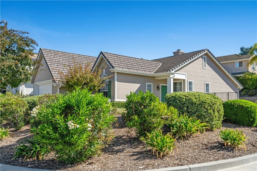 Rare opportunity to own a single level home located on a corner lot in the highly desirable Lang Ranch /Meadow Wood neighborhood. Step inside to discover an open living concept with lots of natural light enhanced by soaring ceilings, recessed lighting, hardwood flooring, wood plantation shutters/blinds and a 2-sided gas fireplace joining the living room and formal dining room. Ideal for everyday living and entertaining. Upgraded kitchen with granite counters has ample cabinet space and modern finishes. Primary suite features a spacious bathroom with jetted tub, dual sinks, separate glass enclosed shower, extra large walk-in closet and sliding door to the private backyard. Two additional bedrooms are generously sized one has a double door entry and was being used as an office. Enjoy the benefits of a two-car attached garage with built-ins and a large separate laundry room with lots of cabinets. This professionally landscaped property features beautifully designed brick inlaid walkways/steps and a large covered patio in the private backyard - perfect to relax or entertain. Close proximity to the 23 and 101 freeways, parks, restaurants and shopping. Award winning Lang Ranch Elementary is just blocks away. This home is the perfect blend of privacy, charm and location!
