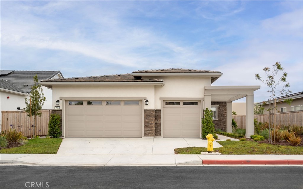 You will love this stunning, single story home in the highly coveted Skyview Estates development in Orcutt. This home was built in 2024, is like new, and has more than 50,000 in upgrades throughout the house and backyard. This home is move in ready and is perfectly located less than 20 minutes to Vandenberg Space Force Base, is in the very desirable Orcutt Union School District, and is walking distance to Valley Christian Academy. As you walk in you will notice the 10 ft ceilings, and an open floorplan that exudes light and space that is ideal for entertaining. The spacious primary suite has a large walk in shower, dual vanity sinks with quartz countertop, a roomy walk-in closet, and a sliding door that leads to the patio. Throughout the house you will notice the immaculate upgrades that are sure to impress including upgraded backsplash, countertops, flooring, recessed lighting with dimmers, and remote controlled window coverings. In the large, very desirable, 3 car garage, the Tesla EV charger has already been installed. You will appreciate the low maintenance backyard fully landscaped and upgraded flagstone gives plenty of space to enjoy dining outside while relishing in the perfect Central Coast climate. The home has solar that is owned and the entire house is highly energy efficient. Call your realtor today as you don't want to miss your chance to own this gorgeous, fully upgraded, brand new looking home in Orcutt.