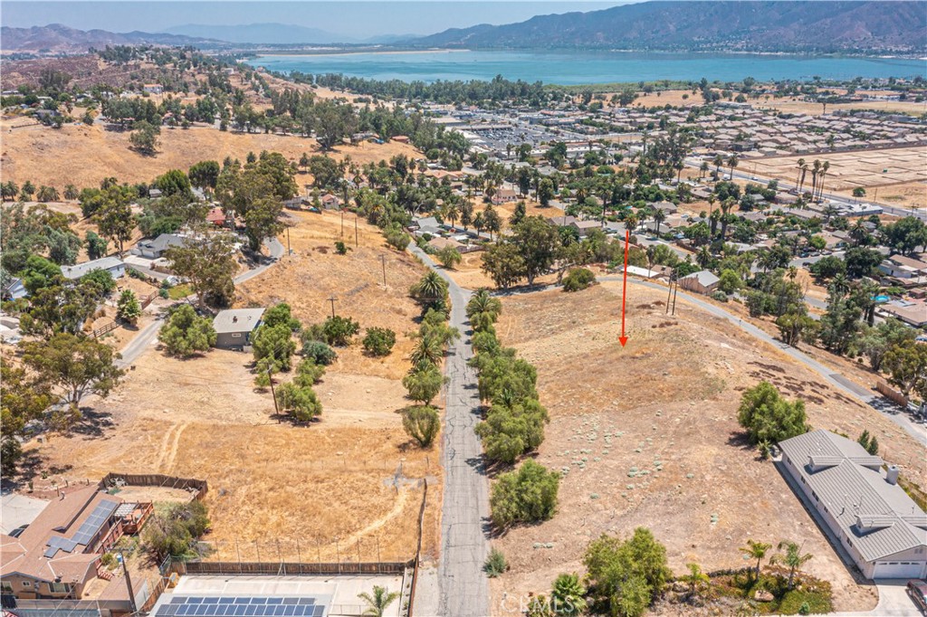 Two adjacent lots are available for sale at $45000 for both BEING SOLD TOGETHER, APN# 378-223-050 (2,614 sq ft) and APN# 378-223-051 (3,049 sq ft) are located on a paved street in the vibrant city of Lake Elsinore, specifically in the Country Club Heights area. These side-by-side lots offer a prime development opportunity, conveniently located near shopping centers, schools, and the 15 freeway for easy access to amenities. Please note, the seller does not have plans, permits, or reports for these properties. Buyers and their agents are strongly encouraged to conduct their own due diligence to verify property boundaries, utility access, easements, and development requirements with the City of Lake Elsinore Planning Department and the Elsinore Valley Municipal Water District (EVMWD). All information is believed to be reliable but is not guaranteed by the seller or their agents. For more details, please contact the listing agent directly.