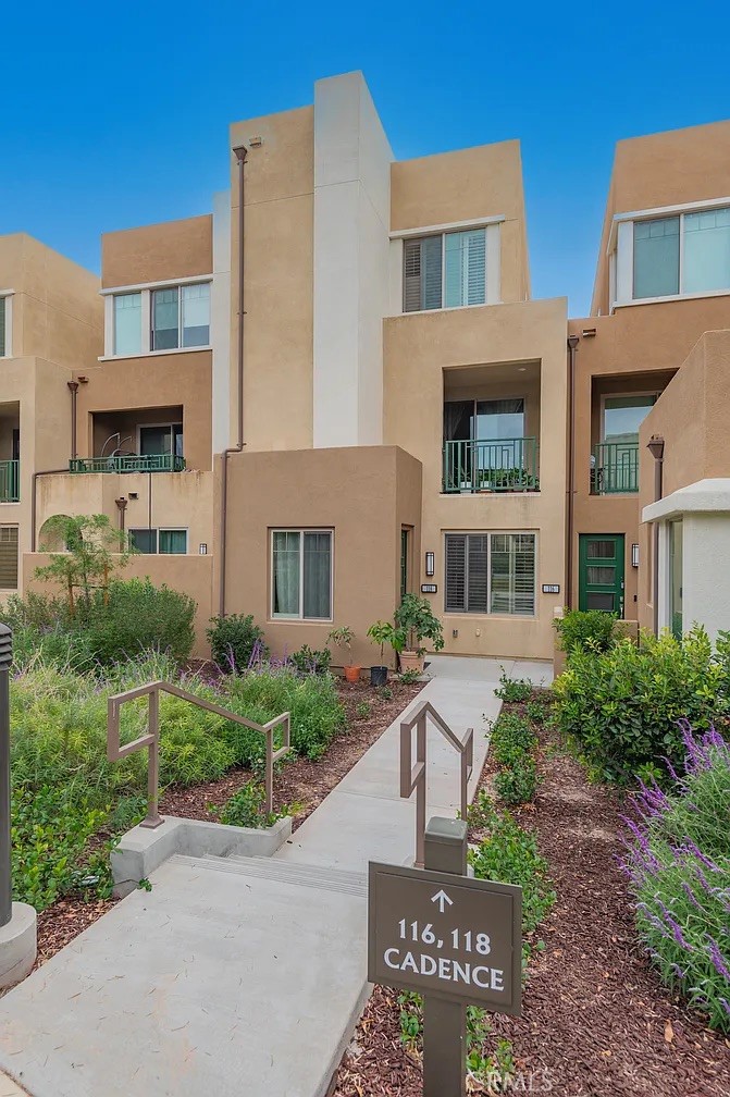 Stunning Modern Home in Great Park Neighborhoods! Total 3 bedroom, 3.5 bath, 2-car attached garage home nestled in the fabulous Great Park Irvine! 1 primary bed and bath downstairs first floor + 2 more primary suites upstairs. Beautiful open floor-plan featuring a chef's kitchen and large sit-down granite island overlooking the living and dining rooms. Wood-look laminate flooring with carpeted bedrooms and stairway. Plantation shutters on the windows. Refrigerator, washer, and dryer included. Great Park residents association -- Including an Olympic-sized swimming pool, playground, zen gardens plus Masterplan amenities including 5 parks, 3 full court basketball courts, 2 junior Olympic pools, 4 spas, 3 club rooms, BBQ picnic destinations at every park and one greenhouse. Award-winning Irvine unified school district and just minutes from dining destinations at the Woodbury Shopping Center, Five Points Amphitheater Irvine Spectrum, John Wayne Airport, Kaiser Permanente, and nearby connecting freeways ( I-5, 241, 133, & 73). One of the best choices for your next home!