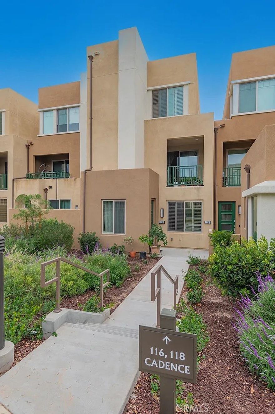 Stunning Modern Home in Great Park Neighborhoods! Total 3 bedroom, 3.5 bath, 2-car attached garage home nestled in the fabulous Great Park Irvine! 1 primary bed and bath downstairs first floor + 2 more primary suites upstairs. Beautiful open floor-plan featuring a chef's kitchen and large sit-down granite island overlooking the living and dining rooms. Wood-look laminate flooring with carpeted bedrooms and stairway. Plantation shutters on the windows. Refrigerator, washer, and dryer included. Great Park residents association -- Including an Olympic-sized swimming pool, playground, zen gardens plus Masterplan amenities including 5 parks, 3 full court basketball courts, 2 junior Olympic pools, 4 spas, 3 club rooms, BBQ picnic destinations at every park and one greenhouse. Award-winning Irvine unified school district and just minutes from dining destinations at the Woodbury Shopping Center, Five Points Amphitheater Irvine Spectrum, John Wayne Airport, Kaiser Permanente, and nearby connecting freeways ( I-5, 241, 133, & 73). One of the best choices for your next home!