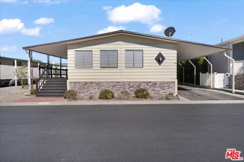 Photo of 21317 Blue Curl Way #230, Canyon Country, CA 91351 (MLS # 26102012)