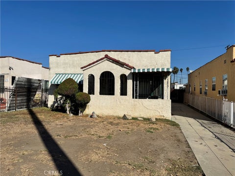 Photo of 1429 W 62nd ST, Los Angeles, CA 90047 (MLS # RS26222438)