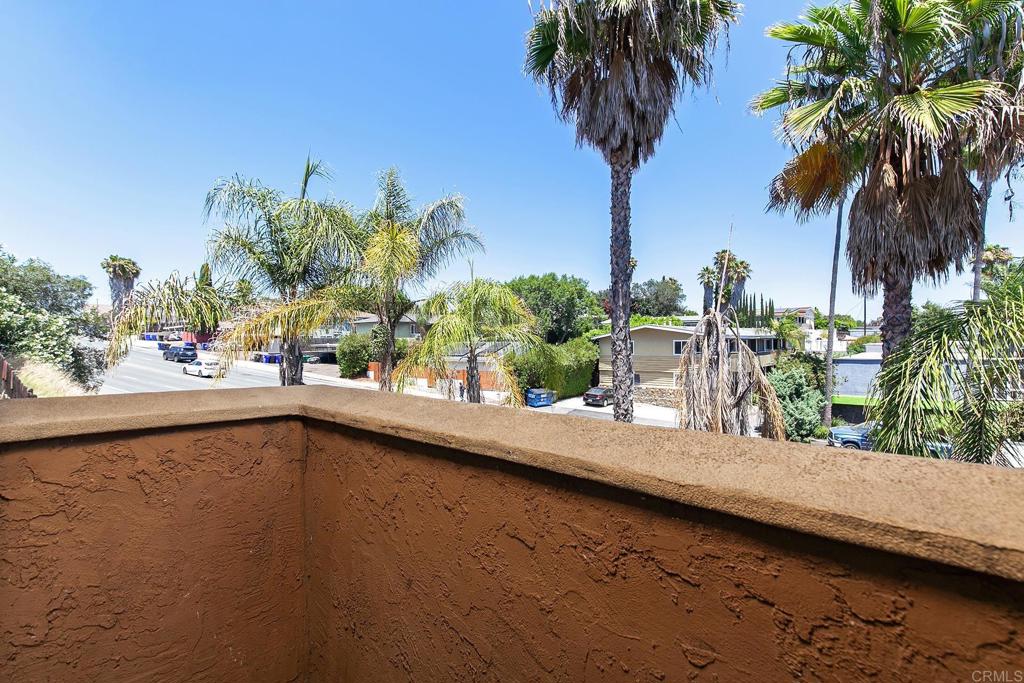 Turnkey 2 Bedroom Condo Near SDSU - Ideal for First-Time Buyers or Investors! Welcome to 4334 College Avenue, a beautifully updated second floor 2 bedroom, 1 bath condo nestled in the vibrant College Area of San Diego. Just minutes from San Diego State University (SDSU), this move-in-ready home offers a perfect blend of comfort, convenience, and investment potential. Step inside to discover a stylish interior featuring modern vinyl plank flooring, recessed lighting, and a bright open concept layout. The spacious living room flows seamlessly into the dining area and kitchen, making it ideal for both relaxing and entertaining. The kitchen boasts granite countertops, painted cabinetry, and stainless-steel appliances. Enjoy the privacy and tranquility of being on the top floor, with no neighbors above you. This unit is set in a well-maintained gated community with lush landscaping, mature palm trees, and a peaceful courtyard feel. The indoor laundry closet with stackable washer and dryer and private 1 car garage with additional storage space add to the convenience. Whether you're looking for your first home, a low-maintenance lifestyle, or a rental property near SDSU, this condo is a fantastic opportunity.