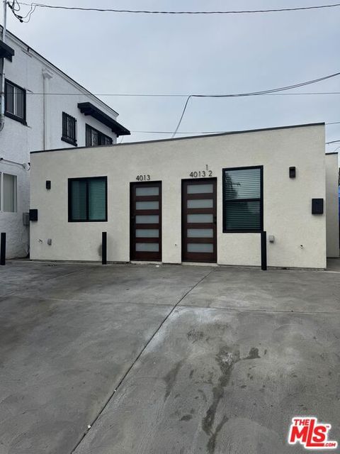 Photo of 4013 S Walton Avenue, Los Angeles, CA 90037 (MLS # 26663307)