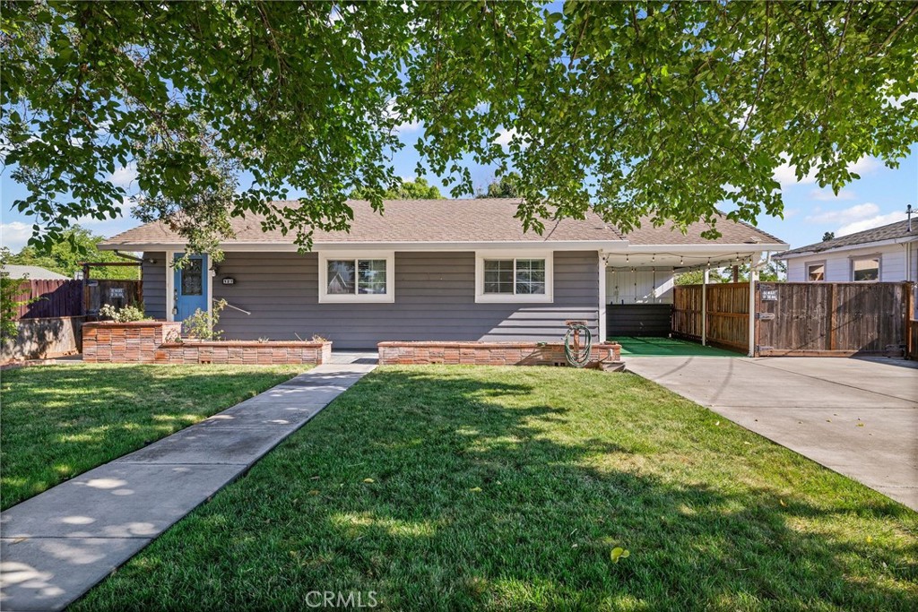 Welcome to this beautifully maintained 2-bedroom, 2-bath home in Orland! Inside, a spacious living room provides plenty of room to relax or entertain. The owned solar system helps keep energy costs low while ensuring year-round comfort. The kitchen offers ample storage and workspace, while a dedicated laundry room includes a washer, dryer, folding area, and extra storage. One of the bathrooms features a large jetted bathtub with a shower combo—perfect for relaxing after a long day. Step outside to enjoy a large covered patio—ideal for morning coffee, barbecues, or evening gatherings. A private hot tub, tucked away in its own custom enclosure, offers the ultimate retreat. The yard is equipped with a sprinkler system in both the front and back, shaded by mature trees in the front, and enhanced with fruit trees including lemon, orange, cherry, pear, and walnut. A water faucet at the far north end makes gardening easy, and a storage shed adds extra convenience. Additional highlights include concrete side parking—perfect for an RV or boat—and a spacious area at the far north end with endless possibilities for a garden, workshop, pool, or more outdoor living. All of this is located in a quiet, friendly neighborhood you’ll love to call home. This well-cared-for property truly has so much to offer—schedule your showing today!