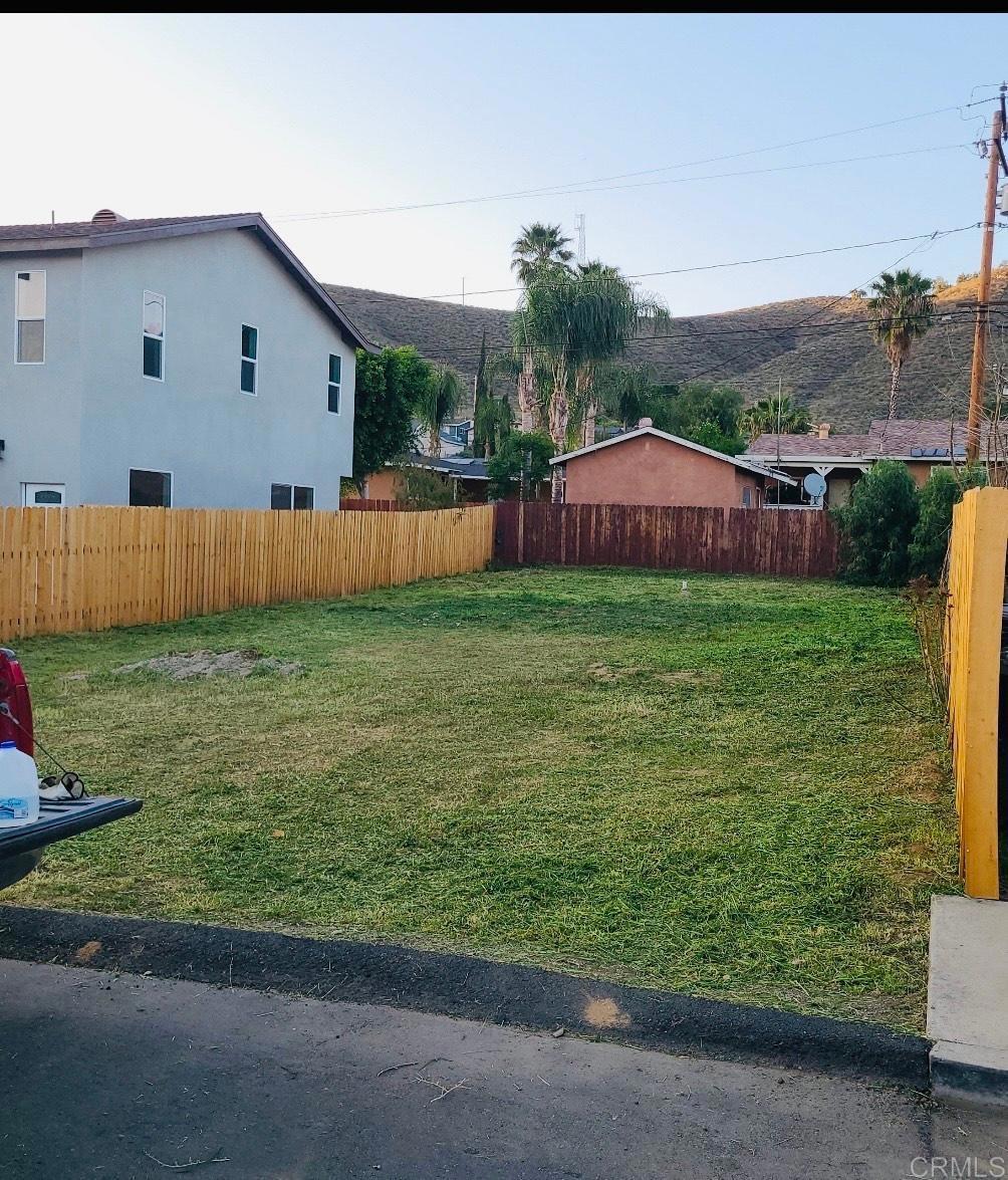 Beautiful lot in great neighborhood. House plans for a 3 bedroom / 2 bath home, may need to be submitted to the City for approval/corrections. City has plans to bring in public sewer, buyer to check with the city. Utilities are at the street. Close to new built homes.