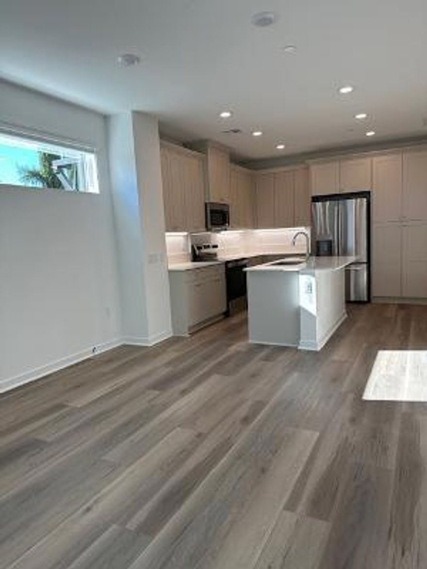 9' High Ceiling in this BRAND NEW 2-level Townhouse gives you abundant natural light! Private W/D gives you convenience! The outlet of 240V (will charge much faster than 120V!!) for E-vehicle in your garage makes you smile, and don't forget you garage allows parallel parking for 2 cars! Solar Panel purchased to reduce your energy bills! Radiant Cooking on FLAT Surface means Cleaning becomes an easy job! Water-Proof Luxury Vinyl Floor makes you worry-free! Quartz Counter Top is known for Stain-Free! We pick this End-Unit Townhouse so that you have less Common Wall, got it? What more can you ask? EVERY thing is NEW, NEW, NEW!!  At the entrance, New Construction Builder Williams Home's Banners will be flying to welcome you, because they are selling NEW townhome community called Valley Villas. Look for Building 8!! Move in now to enjoy being  the first resident of Unit 5!! Turn this new page of your life, NOW!