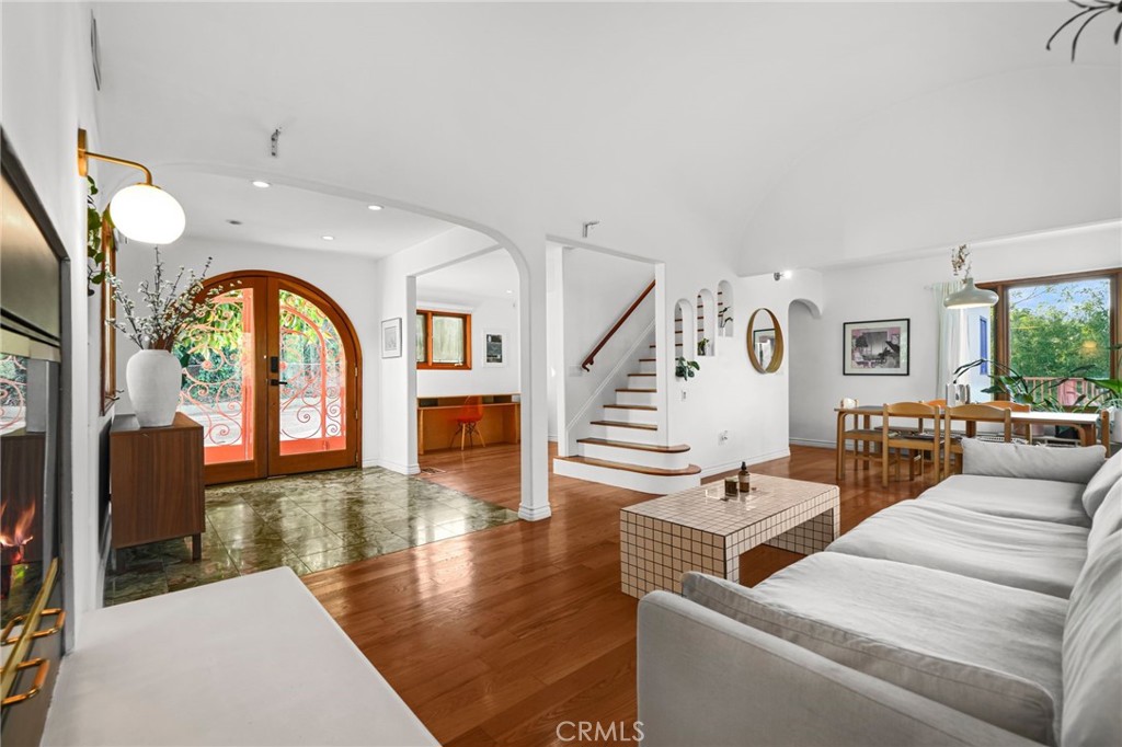 Welcome to 4104 Sea View Drive, a Spanish style retreat in the hills of Mt. Washington. This three bedroom two and a half bath home offers 1,876 square feet of inviting living space, surrounded by serene trees and sweeping views. Timeless architecture and a tranquil ambiance create a sense of warmth and character throughout. Set on a remarkable 22,218 square foot lot with two lots, this property offers both beauty and potential. Whether enjoying quiet mornings on the terrace, entertaining under the open sky, or envisioning additional building dreams the possibilities are endless. As one of the largest lots in Mt. Washington, this is a rare sanctuary above the city. The garage has been converted and there is a basement with additional space.