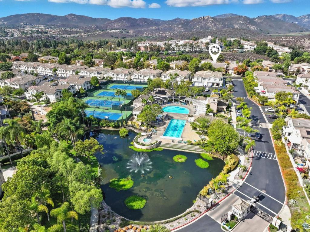 Welcome to Morada at Bernardo Vista Del Lago! This light and bright corner unit is tucked away in the quiet side of one of Rancho Bernardo’s most desirable gated communities. Enjoy resort-style amenities including sparkling pools, relaxing spas, tennis and pickleball courts, a fitness center, clubhouse, and scenic walking and biking trails. The downstairs 1-bedroom, 1-bath condo offers a south facing entry door, open floor plan with a cozy fireplace, updated flooring in the bathroom, in-unit laundry, and a private east-facing patio that captures beautiful morning sunlight. A rare 1-car garage versus a carport adds appeal and utility to the unit as a whole. All uncovered parking spaces are open and non-reserved for residents and guests. Perfectly located near top-rated Poway schools, quick freeway access, shopping, and dining, this condo offers a blend of comfort and resort-style living.