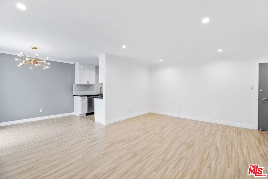 Beautifully bright and quiet corner unit with only one shared wall, ideally situated between Sunset Plaza and Santa Monica Blvd in the heart of West Hollywood. This updated home features spacious rooms with light wood laminate flooring, recessed lighting, and abundant storage throughout.The kitchen is equipped with stainless steel appliancesincluding refrigerator, dishwasher, range, and microwaveplus elegant stone countertops and crisp white cabinetry. A dining area connects the kitchen to a private balcony overlooking the peaceful courtyard, perfect for morning coffee or evening relaxation.The generously sized primary suite enjoys a large window that fills the room with natural light, excellent closet space, and a stunning marble bathroom complete with a soaking tub and separate shower.Building amenities include a sunny pool with lounge seating, exercise room with up to date equipment, a spectacular rooftop deck offering 180-degree city views, ideal for relaxing or entertaining guests. Additional highlights include one conveniently located parking space and storage unit near the entrance, guest parking, and a community laundry area. Located moments from world-class dining, shopping, and entertainment, this home offers easy access to The Grove, Beverly Center, and Cedars-Sinai. Experience the best of West Hollywood living in this serene, stylish retreat.