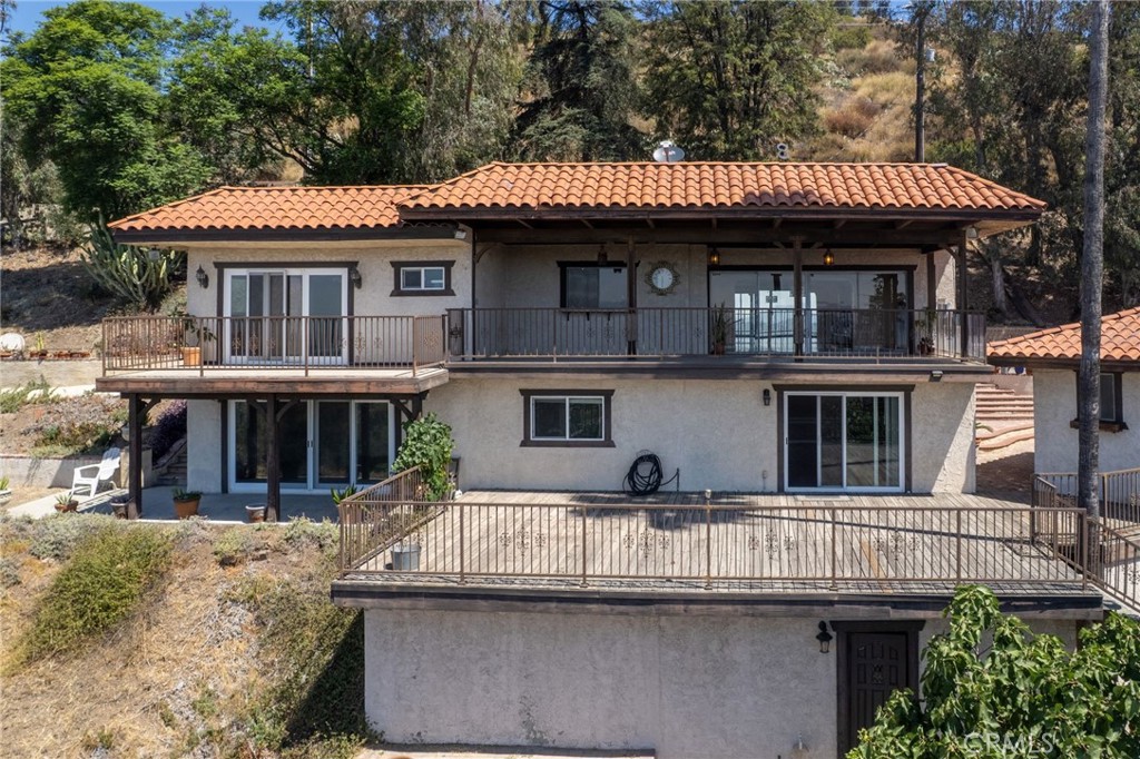 View, View, View on almost an Acre lot, 42,254 sq ft lot !!! Rare Investment Opportunity with Panoramic Views in Glendora. 3 bedrooms with one entertaining room with door leading to 180 degree breath taking view. Discover a truly one-of-a-kind property nestled in the peaceful and secluded hills of Glendora. incoming ADU PLAN, CHECK THE MAP.This exceptional listing features two units AS ONE HOUSE, PLUS ADU,THREE UNITS POSSILBE IN FUTURE, THIS distinct buildings on a single lot, offering incredible flexibility—perfect for multi-generational living, an income-producing rental, or a private in-law suite. Enjoy stunning, panoramic views of the San Gabriel Valley and distant Los Angeles. The property has been lovingly maintained by the same families for decades and is now ready for its next chapter. Located just minutes from downtown Glendora, highly rated school districts, renowned shopping centers, local markets, and top dining spots, all while being close to nature trails and open space. Convenient access to Pasadena, downtown LA, and the rest of the San Gabriel Valley completes the picture. Don’t miss this rare chance to own a unique home in one of Glendora’s most tranquil neighborhoods. Must see to truly appreciate!