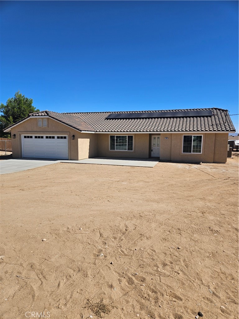 All Electric New Construction 3 Bedroom, 1 3/4 Bath Home on a fully fenced centrally located 1/2 Acre lot. 2 of the 3 bedrooms have walk-in closets. Indoor Laundry Room includes a Sink. All of the livable floor areas are tiled with the exception of the carpeted bedrooms. PV Solar system is paid for and included in the sale.