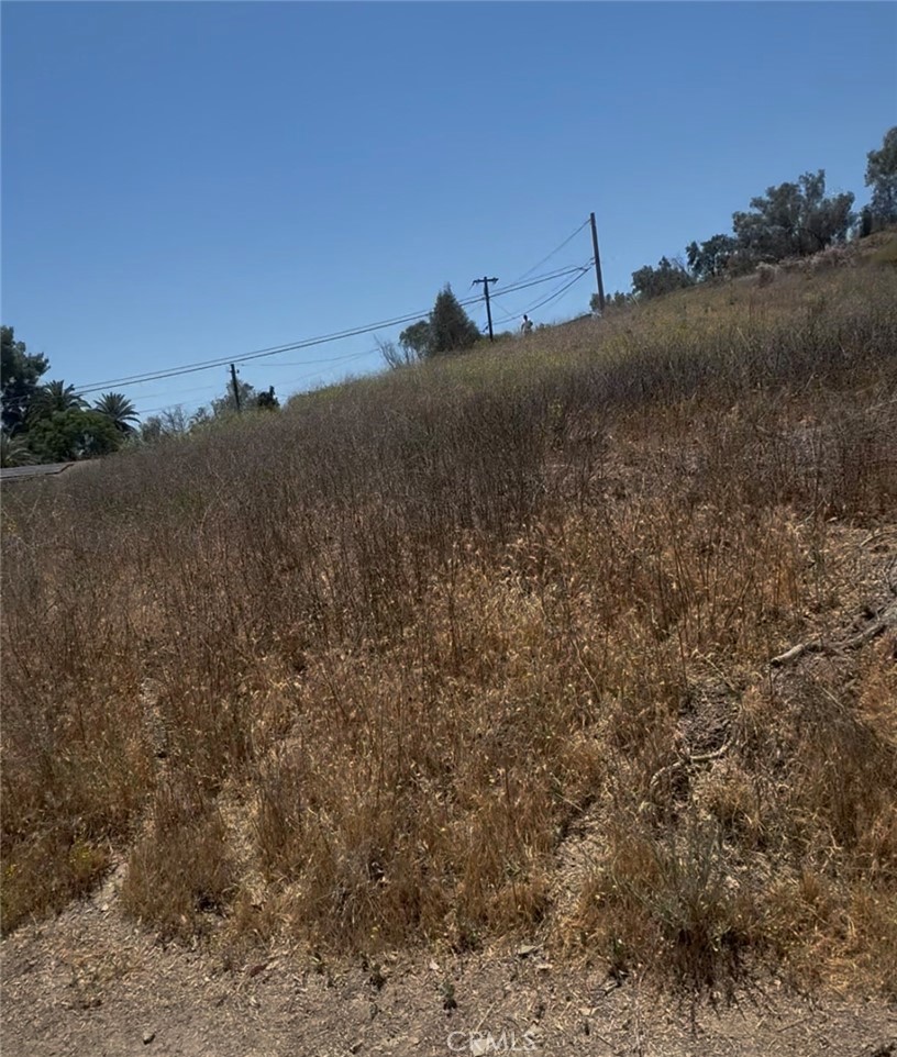 It's 3 lots approx. 22000 sqft. Beautiful view land close to Fwy and Lake of Elsinore. Drive by and see.