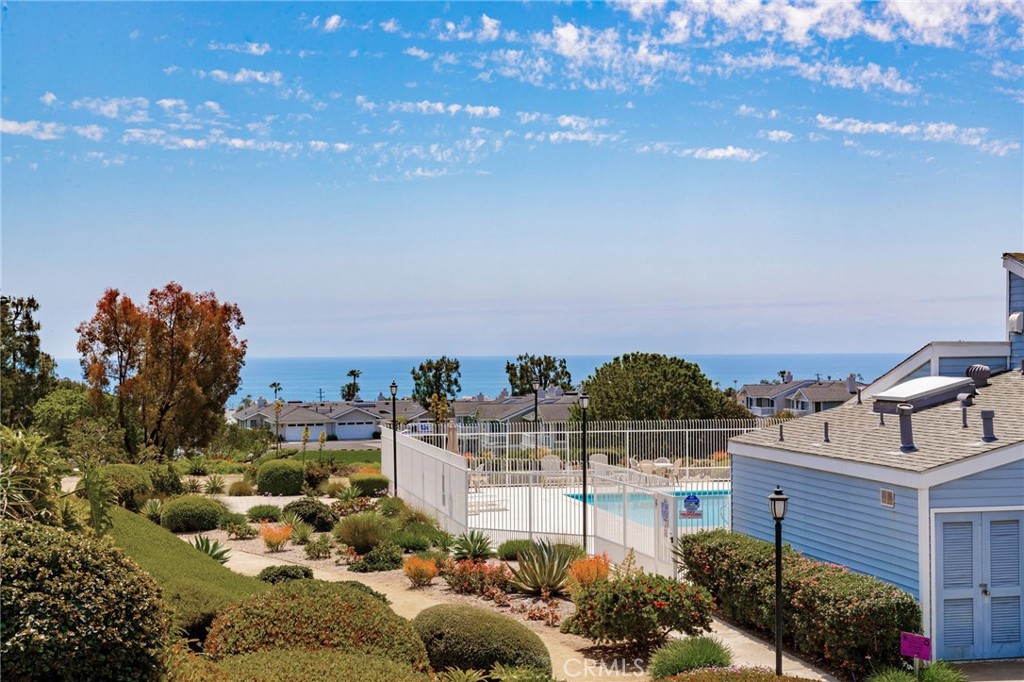 Tucked at the quiet end of a cul-de-sac, this upgraded coastal condo offers privacy and tranquility in a beautifully landscaped setting. Located at 24612C Harbor View Dr, the residence features 4 bedrooms, 2.5 bathrooms, and approximately 1,650 square feet of thoughtfully renovated living space.
The heart of the home is a modern kitchen with granite countertops, stainless steel appliances, and contemporary finishes. An open-concept floor plan connects the kitchen to the dining and living areas, where neutral tile flooring, recessed lighting, ceiling fans, and a fireplace create a warm, inviting atmosphere. The main living area opens to an ocean-view deck, offering a relaxing outdoor space to enjoy coastal breezes.
Upstairs, the primary suite features vaulted ceilings, ocean views, a private balcony, and a remodeled bathroom with an adjacent area ideal for an office or workout space. Two additional bedrooms are also upstairs—one with its own private balcony—while a downstairs bedroom opens to a peaceful cement courtyard.
Outdoor living includes an ocean-view deck, private balconies, a patio, and the cement courtyard. All exterior decking and balcony surfaces have been upgraded with low-maintenance Trex material (courtyard excluded).
The 60-home community offers amenities such as a pool, spa, and clubhouse with a full kitchen. The location provides convenient access to Dana Point Harbor, Strands Beach, Salt Creek Beach, and the Lantern District. Nearby attractions include Monarch Beach Golf Links, luxury resorts, and a variety of coastal dining and shopping options. Walkability to Dana Hills High School and access to the Dana Point Trolley enhance the home's lifestyle appeal, with connections to surrounding beach communities.
This property blends functional design and ocean views with relaxed Southern California living in one of Dana Point’s most desirable neighborhoods.
*Virtual staging has been used in select images to help visualize furniture layout possibilities.