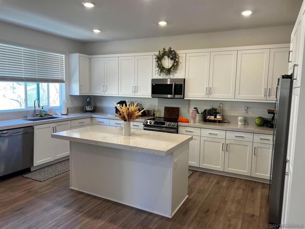 Stunning 2024 built Modern home. This beautifully designed home offers an open concept layout with seamless flow between the kitchen and living areas pefect for relaxing and entertaining. Ideally located near shopping, major freeways, and just minutes from dowmtown San Diego convenience meets comfort in every detail. Enjoy premium modern finishes throughout along with access to the community amenities including a pool, spa, clubhouse and fitness center. The property has a spacious 2 car garage and includes a fully owned solar system with a backup battery providing energy efficency and peace of mind.