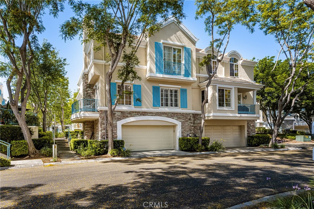 Newport Ridge Vistas is the quintessential example French Provincial Architecture in Newport Coast. If your lucky enough to be in the know, you know Newport Coast is one of Southern California's premier location. A Pied a Terre's in Newport Coast starts at $1,500,000 and Estates on the Coast can reach an eye watering $50-$75 Million. Needless to say you're keeping company with the 1% who are lucky to live here. 81 Chandon was tastefully remodeled 4 years ago and expanded to close to 2400 Sq/ft with 4 bedrooms and 2.5 bathrooms. This is an ideal home with a convenient lock and go lifestyle, access to all the amenities Newport Coast is known for. The floor plan has vaulted ceilings with lots of windows and plantation shutters, providing abundant natural light that flows throughout the entire home. The elegant dining room leads to a spacious kitchen with granite counter tops, including a breakfast nook with a view of the pool and spa. The family room has a cozy, relaxing fireplace from which a glimpse of the Pacific Ocean can be enjoyed. Adjacent to the family room is a wood paneled office that can be used as a bedroom for your convenience. Upstairs, the owners permitted and expanded square footage into a loft loft which could easily be converted to a third bedroom. The master bedroom has a stunning, elegant fireplace and a balcony with a view of the pool. The oversized master bathroom consists of dual vanities, a walk-in shower, and a soaking tub. Plus, there are huge his and hers walk in closets with a laundry chute. Enjoy a high quality of life just a short distance from parks, restaurants, hiking, shopping, beaches, John Wayne Airport, and award-winning schools. Gated entry, swimming pool/jacuzzi access to private tennis courts parks and pools via Newport Coast master association. Shows like a model; this gem won't last. An amazing opportunity awaits you.