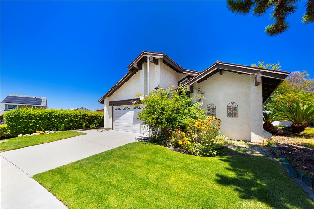 Welcome to 25831 Appian Way, a beautifully maintained 3-bedroom, 2-bath single-story home in the desirable Aegean Heights community of Mission Viejo. Situated on a spacious corner lot, this property offers panoramic views of Saddleback Mountain and an exceptional blend of comfort and convenience. Inside, enjoy the warmth of a cozy fireplace, soaring vaulted ceilings, and an abundance of natural light. The home features an enclosed patio area, perfect for indoor-outdoor living, as well as a private front and backyard ideal for entertaining, gardening, or relaxing with a view.
Residents of Aegean Heights enjoy access to resort-style amenities including a community pool, two tennis courts, and a clubhouse. All this, plus a central location just minutes from the 5 Freeway, top-rated schools, local dining, and shopping centers. Don’t miss this rare opportunity to own a corner-lot gem with breathtaking views in one of Mission Viejo’s most sought-after communities.
