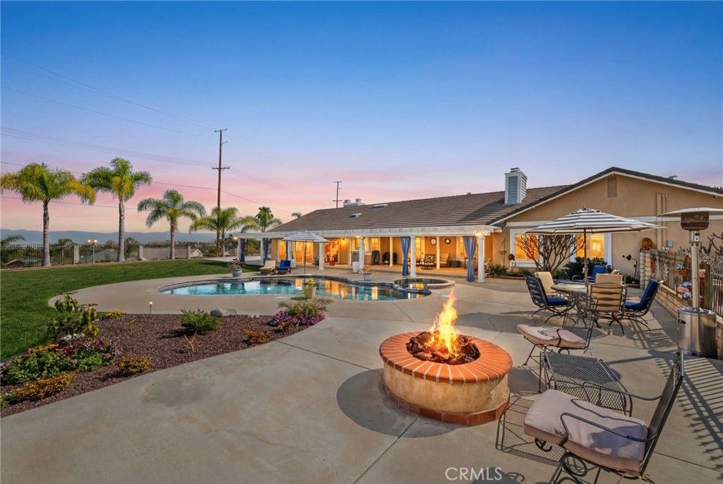 Photo of 15555 Rancho Viejo Drive, Riverside, CA 92506 (MLS # IV26059970)