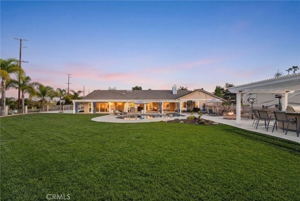 Photo of 15555 Rancho Viejo Drive, Riverside, CA 92506 (MLS # IV26059970)