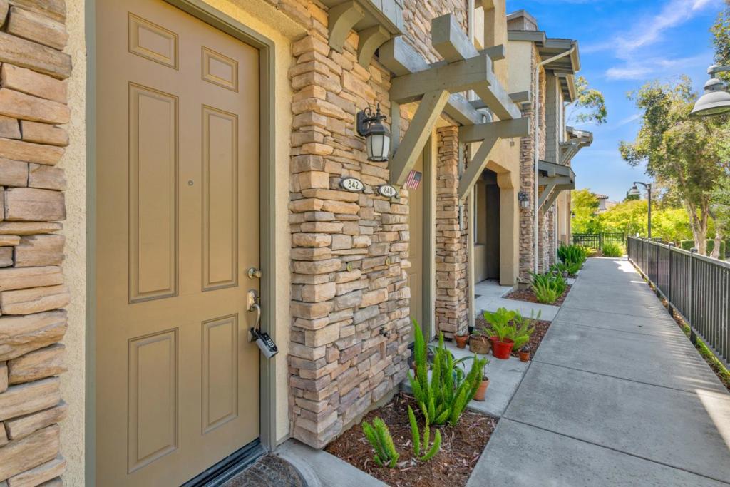 Experience the best of San Luis Obispo living in this beautifully maintained Tumbling Waters condo! This thoughtfully designed home features dual primary suiteseach offering privacy and comfort on their own upper levels. The main floor boasts an open-concept layout with a bright living area, updated kitchen with granite countertops, a convenient powder room, and a private balconyperfect for relaxing or entertaining. Enjoy the added bonus of air conditioning, an uncommon find in SLO condos, along with a spacious two-car tandem garage. Residents also have access to fantastic community amenities, including a clubhouse with full kitchen, fitness center, and tot lot. Located just minutes from Edna Valley wine country and within walking distance to shopping, restaurants, and local breweriesthis home offers the ideal blend of comfort, convenience, and Central Coast charm.