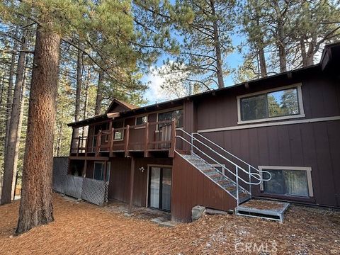 Photo of 615 Ash Dr, Green Valley Lake, CA 92341 (MLS # IV26004237)