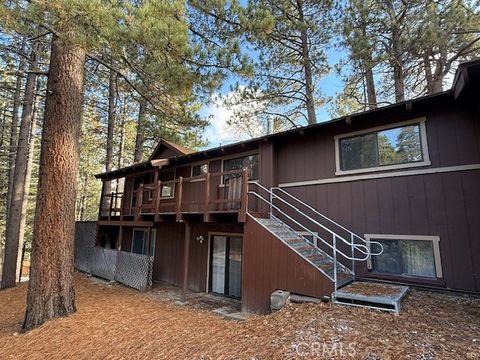 Photo of 615 Ash Dr, Green Valley Lake, CA 92341 (MLS # IV26004237)