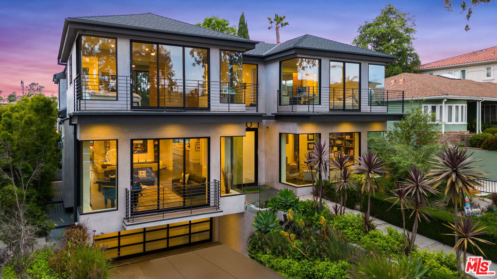 This stunning and luxurious home is located in the coveted Beverlywood/Cheviot Hills neighborhood of Los Angeles. One of the largest, well-designed homes boasting an impressive 11,000 sq ft of living space, perfect for those who demand the very best in comfort, luxury and style with 8 bedrooms and 10 bathrooms. You'll notice the impeccable finishes - white oak hardwood flooring, Calcutta marble, Wolf appliances and refrigerated wine cellar visible through the custom bar. Primary bedroom with dual wardrobes is located on the second floor with its own laundry and five full bedroom suites. Laundry is also in the lower level alongside a 2 bedroom, 2-1/2 bath with its own kitchen and family room. Don't miss the beautiful custom theatre and gym. The backyard is an oasis, featuring a 20 x 40 full sized saltwater infinity edge pool with wave-jets and underwater speakers! This masterpiece on an oversized lot cannot be replicated today! Don't miss your chance to own this incredible piece of real estate.