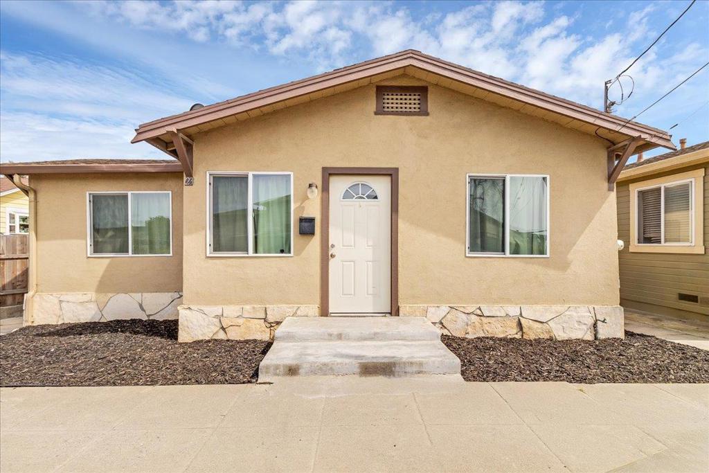 This charming 3-bedroom, 1-bath home located in the heart of Salinas. This cozy residence offers a comfortable 770 sq ft of living space with updated features. The kitchen boasts granite countertops, an exhaust fan, and a gas oven range, perfect for preparing family meals. Laminate flooring throughout adds a touch of modernity, while the wall furnace provides warmth during cooler months. The property is equipped with double pane windows, enhancing energy efficiency. A notable feature is the updated bathroom, designed with contemporary fixtures. Although there is no garage space, there is one off street parking spot. This delightful property offers a welcoming environment and is ready for new owners to make it their own.