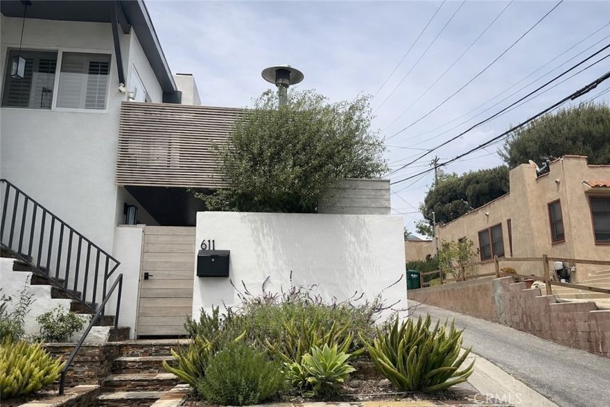 Furnished (inquire for unfurnished option). Ideally located in the highly desirable Avenues of South Redondo, this beautifully renovated home is light and bright with high ceilings upstairs and an open-concept living and kitchen area that opens to an outdoor deck—ideal for entertaining. The primary suite, furnished with a king bed, is a private retreat featuring high-end finishes and a spa-inspired bathroom with heated floors, soaking tub, and steam shower. Additional highlights include central air conditioning, plantation shutters, rich wood flooring throughout, and flexible work-from-home spaces. The lower level offers two spacious bedrooms (one king, one queen), a stylish bathroom with heated floors, a dedicated laundry room, and direct access to a secure, fenced patio. Two-car garage accommodates one mid-size SUV and one golf-cart–sized vehicle. Offered furnished, with flexibility for partially furnished or unfurnished arrangements. Close to the beach, downtown shops and restaurants, and award-winning Redondo Beach schools.