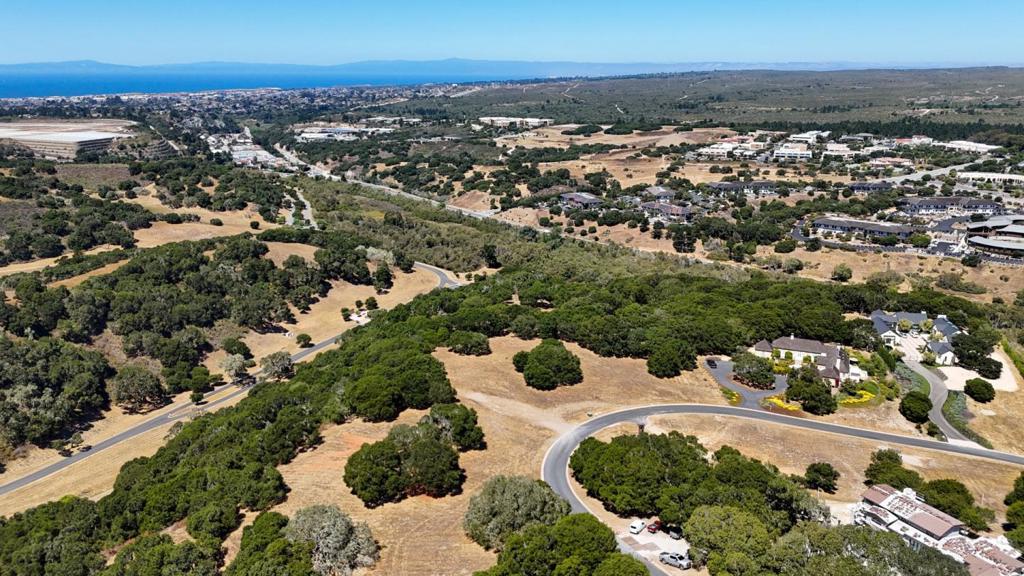 Welcome to one of the most sought after communities along the Monterey Peninsula. This sun drenched almost 3 acre parcel with views of the Monterey Bay, city lights and Santa Cruz mountains makes it a rare opportunity to build your own slice of paradise. Manjares is a private lane close to the entry of Monterra, a gated community with 1700 acres of unspoiled natural beauty. Monterra includes a private golf club, Tehama, along with casual dining, community social events, fitness center, two pools and tennis facility. Enjoy an exceptional temperate micro climate conducive to enjoying the outdoors year long. Minutes away from award winning restaurants, wineries, Carmel-by-the-Sea world renowned beaches, cultural events, art galleries, world class golf courses, hiking and biking, regional airport and Laguna Seca raceway. A social membership to Tehama is included with the lot. Seller is open to a trade.
