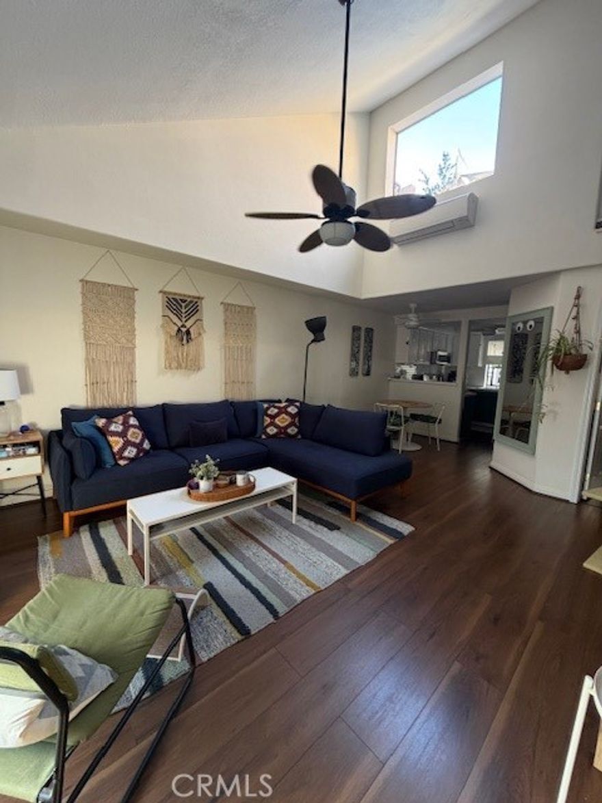 Welcome to Palm Oasis a modern comfort meets coastal style.This beautifully updated two-story condo offers an airy, open layout with no one above you and thoughtful design throughout. Enjoy two spacious primary suites, two full baths, and two private patios, ideal for morning coffee or evening wine.

The remodeled kitchen flows seamlessly into the living area, creating the perfect space for entertaining or unwinding after work. Upstairs, you’ll find new laminate floors, freshly painted bedrooms, and a private entrance for added flexibility. Additional highlights include in-unit laundry hookups (gas & electric), new ac units in every room, two assigned parking spaces, and a secure gated community with lush, Tuscan-inspired landscaping and a stunning travertine entryway. Experience the balance of style, privacy, and convenience.