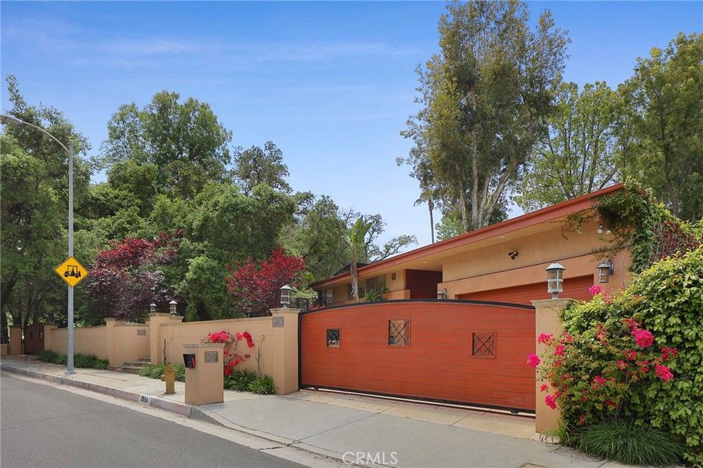 Photo of 3951 Vanalden Ave, Tarzana, CA 91356 (MLS # SR25231904)