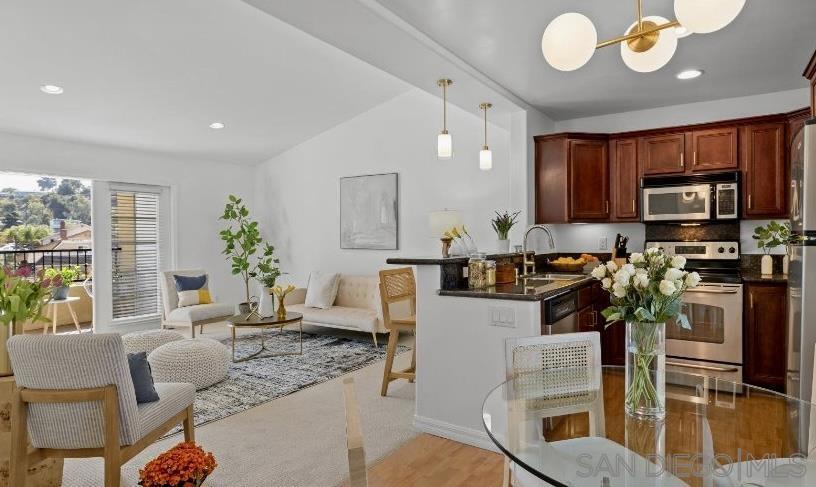Thank you for your interest in this property! We’re thrilled to present this beautifully renovated top-floor condo. Featuring vaulted ceilings, recessed lighting, a private balcony off the living room, a convenient in-unit washer and dryer, and a dedicated storage area, this home combines comfort and style. Step outside and enjoy resort-style amenities, including a refreshing pool, relaxing jacuzzi and small workout room—perfect for unwinding after a busy day. Ideally located within walking distance to SDSU, this condo offers the perfect balance of urban convenience and tranquil living. Enjoy being just minutes away from major freeways, local eateries, and shopping destinations—your urban oasis awaits! We invite you to join us at one of our open houses or reach out to the listing agent to schedule a private showing. (Scroll for Listing Agent phone contact). We look forward to meeting you and helping you discover your next home! Disclosure: This photo is next door unit we are refurbishing to match. Photos coming 8/6.