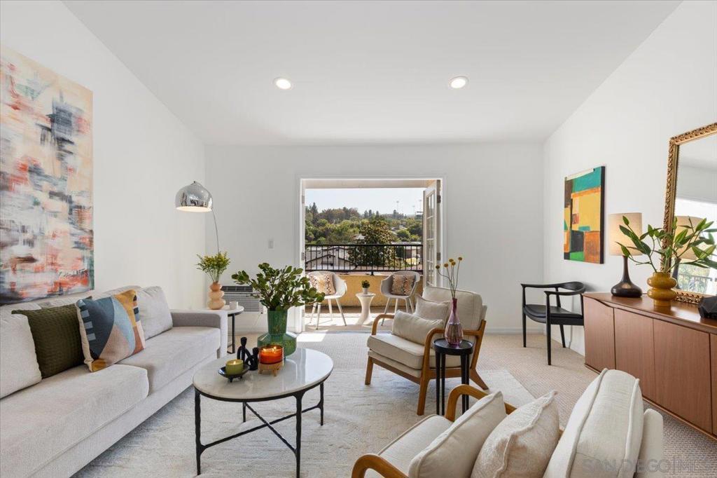 Thank you for your interest in this property! We’re thrilled to present this beautifully renovated top-floor condo. Featuring vaulted ceilings, recessed lighting, a private balcony off the living room, a convenient in-unit washer and dryer, and a dedicated storage area, this home combines comfort and style. Step outside and enjoy resort-style amenities, including a refreshing pool, relaxing jacuzzi and small workout room—perfect for unwinding after a busy day. Ideally located within walking distance to SDSU, this condo offers the perfect balance of urban convenience and tranquil living. Enjoy being just minutes away from major freeways, local eateries, and shopping destinations—your urban oasis awaits! We invite you to join us at one of our open houses or reach out to the listing agent to schedule a private showing. (Scroll for Listing Agent phone contact). We look forward to meeting you and helping you discover your next home! Disclosure: This photo is next door unit we are refurbishing to match. Photos coming 8/6.