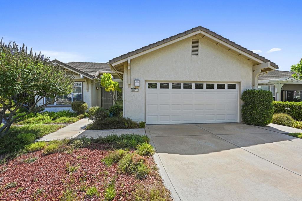 Welcome to Your Perfect Santee Retreat! This beautifully maintained single-story home offers over 1,700 sq. ft. of comfortable living in one of Santee’s most sought-after neighborhoods! Perfectly positioned at the end of a quiet cul-de-sac on a generous 8,398 sq. ft. lot, it blends privacy, charm, and convenience. Step inside to an open and airy floor plan with both formal living and cozy family rooms, bathed in natural light. The bright kitchen features a skylight, sleek oversized island, and plenty of prep space—ideal for gourmet cooking and effortless entertaining. A charming family room with a fireplace and wood mantel sits just off the kitchen, creating a warm, inviting hub for gatherings. The home boasts fresh new interior paint, stylish new flooring throughout, and a new water heater (2024). The spa-inspired main bathroom offers a walk-in closet, separate shower and a large soaking tub for unwinding after a long day. Ceiling fans in every bedroom ensure year-round comfort. Step outside to a spacious Trex deck where you can sip your morning coffee while enjoying sweeping views of the city and surrounding mountains. The private backyard features fruit trees, a thriving garden, and plenty of space to play, relax, or entertain. Additional highlights include an oversized two-car garage with abundant storage, and a location just minutes from parks, schools, shopping, and walking trails. This is more than a house—it’s a place to truly call home!