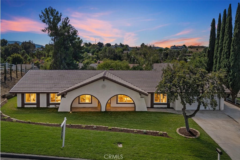 Must-see Fully Remodeled Meadowview Masterpiece. Welcome to 30581 Del Rey; a 4-bedroom, 2-bath home with a versatile bonus room—perfect for a home office or flex space—boasting 2,062 sq. ft. of living space on a generous .52-acre lot in the highly sought-after Meadowview community of Temecula. Upon entry, you’ll find a turnkey, open-concept layout featuring living room and family room with a tiled fireplace, wide-plank luxury flooring throughout, fresh interior and exterior paint, new baseboards, designer recessed lighting, dual-pane windows, and brand-new interior and exterior doors.
The Huge show-stopper Chef’s Kitchen is a true centerpiece, offering custom cabinetry with soft-close drawers, bold waterfall-edge quartz countertops, a spacious island and an additional breakfast bar with seating area, commercial-grade Forno appliances, built-in microwave, a flowing quartz backsplash, statement pendant lighting, and elegant gold finishes. The primary suite is a true retreat, complete with His-and-Hers closets and a spa-inspired ensuite bath featuring a massive walk-in shower, dual-sink vanities, and serene designer finishes. Generously sized secondary bedrooms include modern ceiling fans, while the guest bath features a tub and tiled shower, and dual sink vanity.
Throughout the home, enjoy the comfort of brand-new systems, including A/C, heater, and water heater. Additional upgrades include updated plumbing and electrical (all permitted), a brand-new roof, and a finished garage with epoxy flooring. Outdoors, resort-style landscaping creates a true escape, with a huge backyard offering endless possibilities plus boat storage for added convenience.
As mentioned, this property is in the coveted Meadowview community, known for its scenic beauty, equestrian trails, and clubhouse amenities. As part of the Meadowview HOA, you’ll enjoy access to community amenities like clubhouse, multiple swimming pools, including an Olympic sized lap pool, tennis courts, basketball courts, pickleball courts, park, playground, hiking, equestrian round pen, and equestrian trails. It offers a rare opportunity to live in luxury while enjoying the tranquility of a rural setting—just minutes from parks, award-winning schools, Promenade Mall, and Temecula Wine Country.
