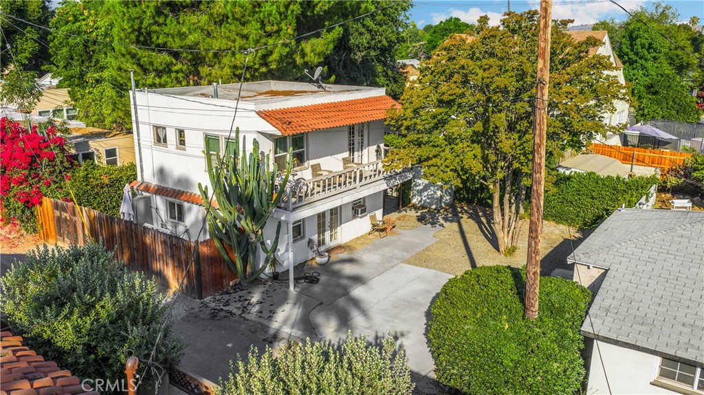 2 UNITS!!! Check 3D Tour!!!! Charming & Versatile in the Historic “Wood Streets”! This beautifully updated 2-bedroom, 2-bath home offers flexibility and income potential with two separate living areas—upstairs and downstairs—each with its own entrance. The lower level is perfect as a granny flat, student rental, or guest suite, while you enjoy the upstairs space, or easily combine into one home. The home’s measured square footage exceeds tax records (buyer to verify) and features fresh interior and exterior paint and updated plumbing. Relax on the inviting front porch or upstairs balcony, and enjoy the peaceful private garden area. Ideally located just down the street from Riverside City College, and close to Polytechnic High, Central Middle School, shopping centers, restaurants, Mount Rubidoux, and entertainment. Quick freeway access makes commuting a breeze. Sitting off the alley for extra privacy, this property blends historic charm with modern updates—making it a perfect starter home, investment property, or multi-generational living solution. Hurry—this one will sell fast!